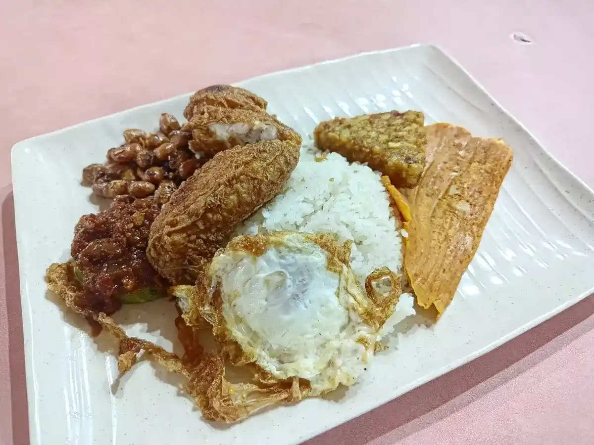 Banana Leaf Nasi Lemak: Nasi Lemak with Chicken Wing, Egg, Ikan Bilis Peanuts, Hash Brown & Otah