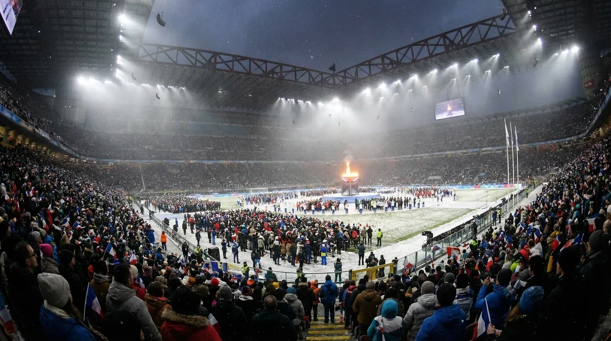 Нощен изглед на стадион Сан Сиро по време на откриването на Зимните олимпийски игри с осветление и публика.