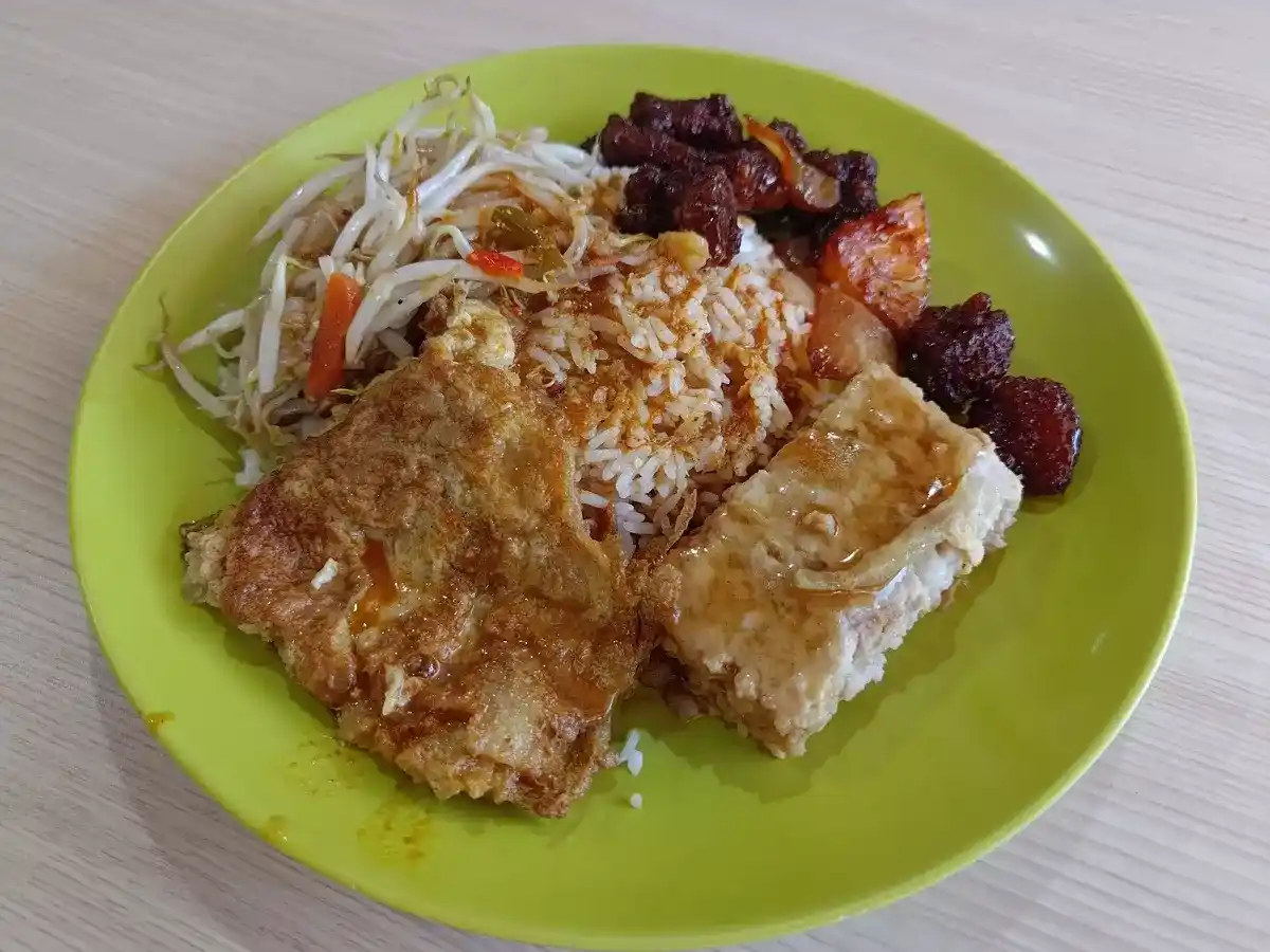 Jurong East Tasty Mixed Rice & Porridge: Sweet Sour Pork, Minced Meat Patty, Bean Sprouts, Onion Omelette with Rice & Curry