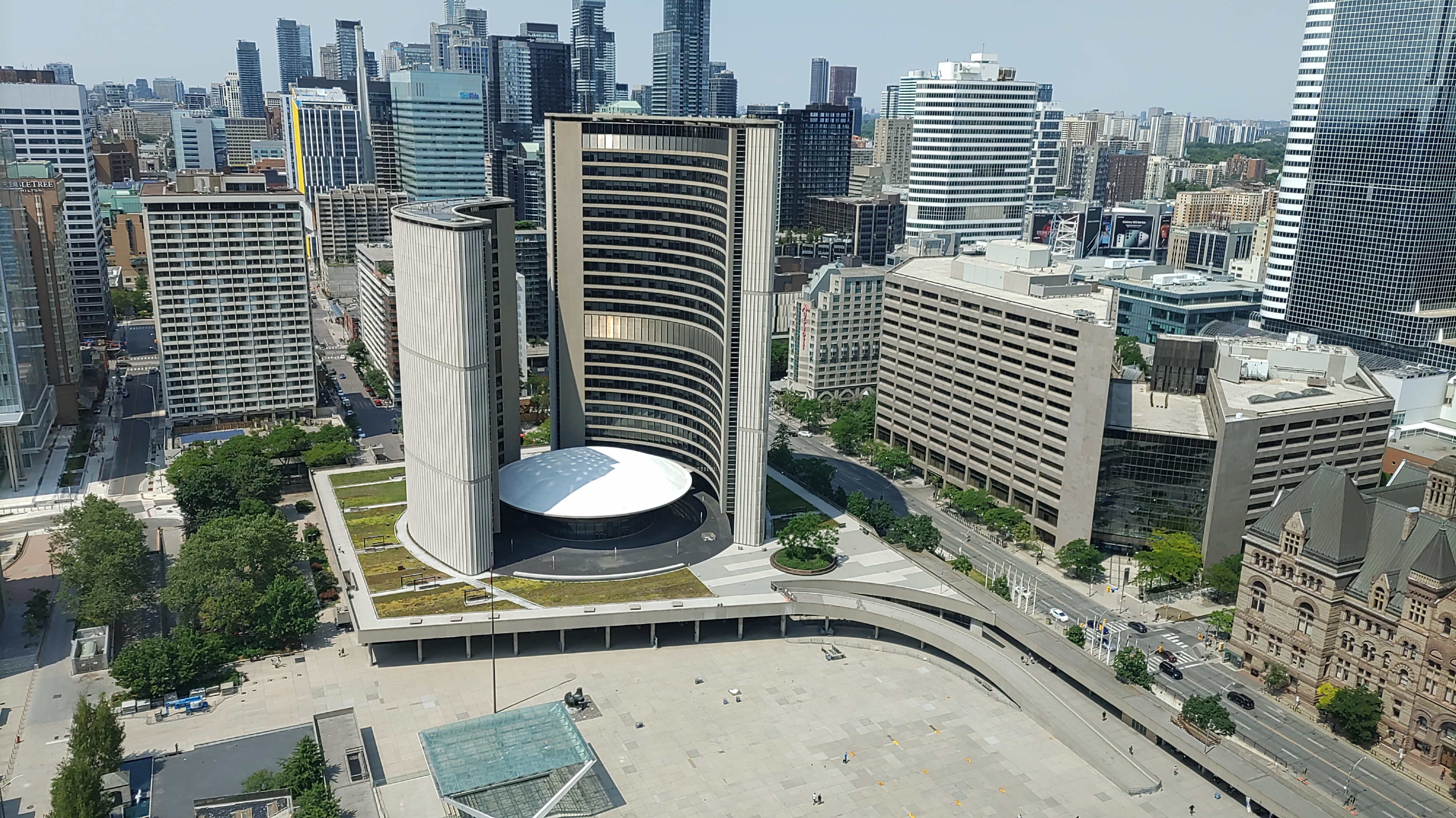 a summer day of Toronto City Hall and Nathan Phillips Hall shot from the Shearaton Centre Toronto.
